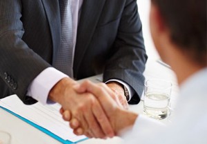 Customs Broker and an importer shaking hands