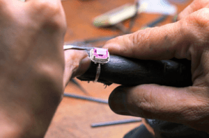 Precious gems mounted in a ring.