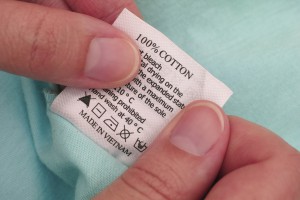 woman holding label